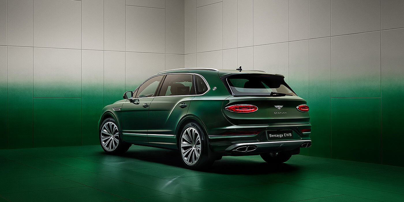 Bentley Manila Bentley Bentayga Extended Wheelbase SUV Rear three quarter view in Light Emerald green paint in green and grey room