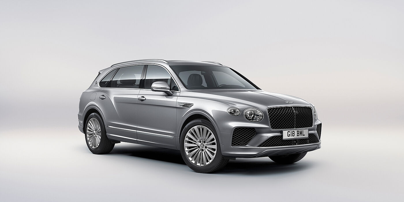 Bentley Manila Bentley Bentayga Extended Wheelbase luxury SUV front three quarter view in Moonbeam paint with 21 inch five spoke painted wheels