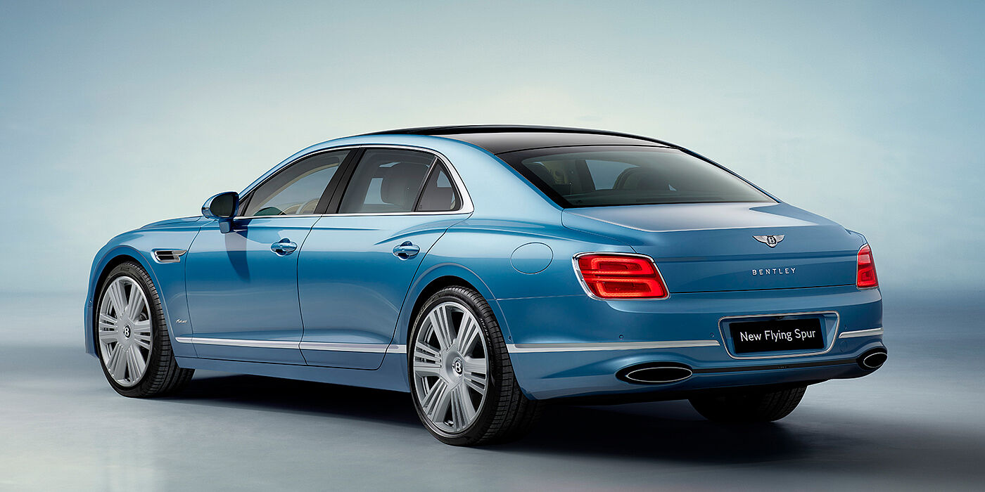 Bentley Manila New Bentley Flying Spur Azure sedan rear view in Light windsor blue by Mulliner paint with 22 inch Azure wheels and chrome exterior details