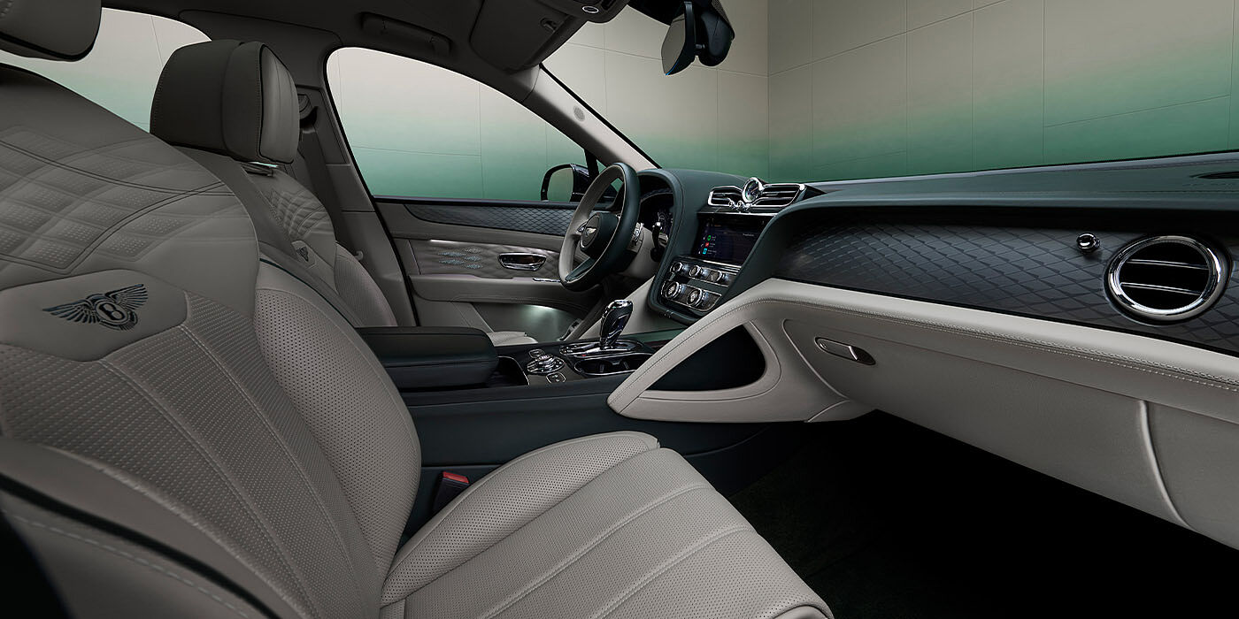 Bentley Manila Bentley Bentayga Extended Wheelbase Atelier Edition SUV front interior in Portland and Cumbrian Green hides with Dark Tint Diamond Brushed Aluminium veneer