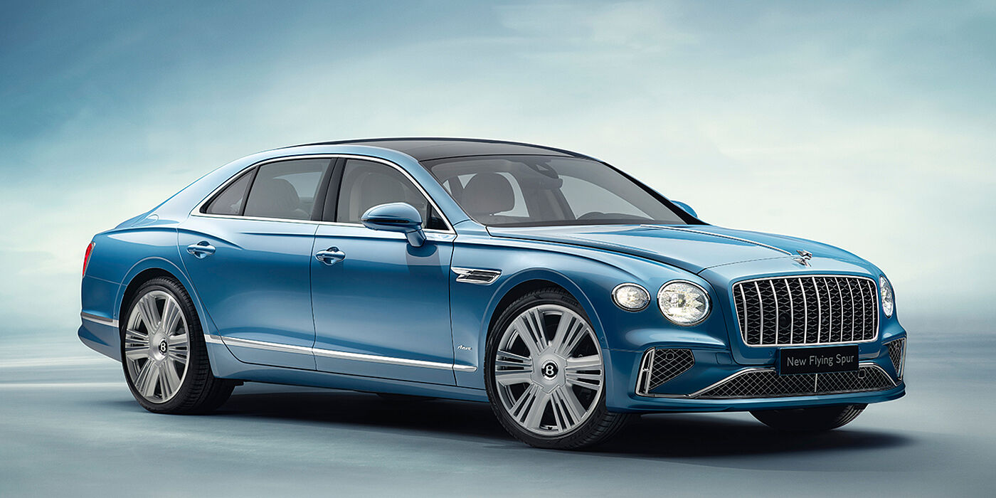 Bentley Manila New Bentley Flying Spur Azure sedan front view in Light windsor blue by Mulliner paint with 22 inch Azure wheels and chrome exterior details