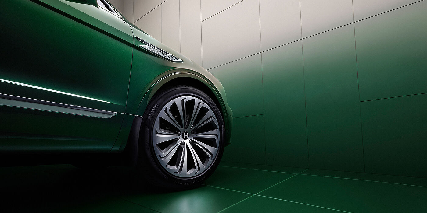 Bentley Manila Bentley Bentayga Extended Wheelbase Atelier Edition SUV in Light Emerald green paint front side detail with 22 inch 10 spoke wheel