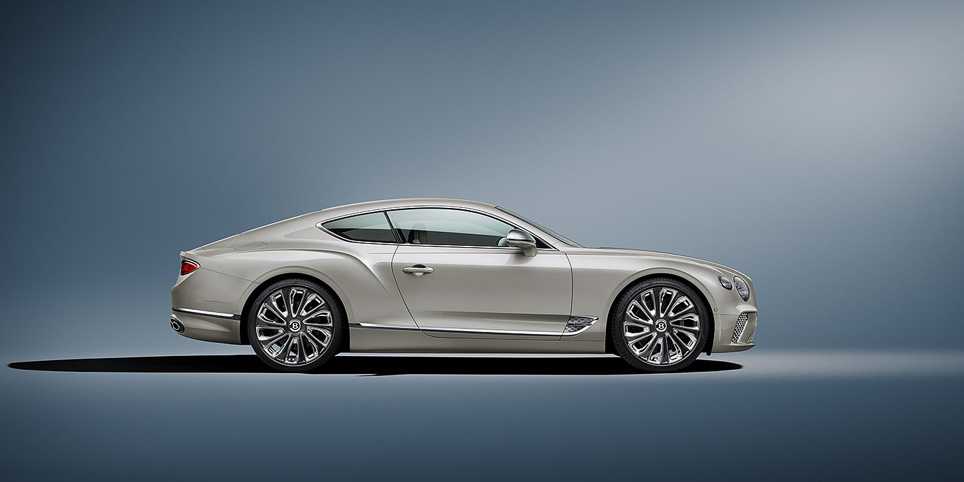 Bentley Manila Bentley Continental GT Mulliner coupe in White Sand paint front 34