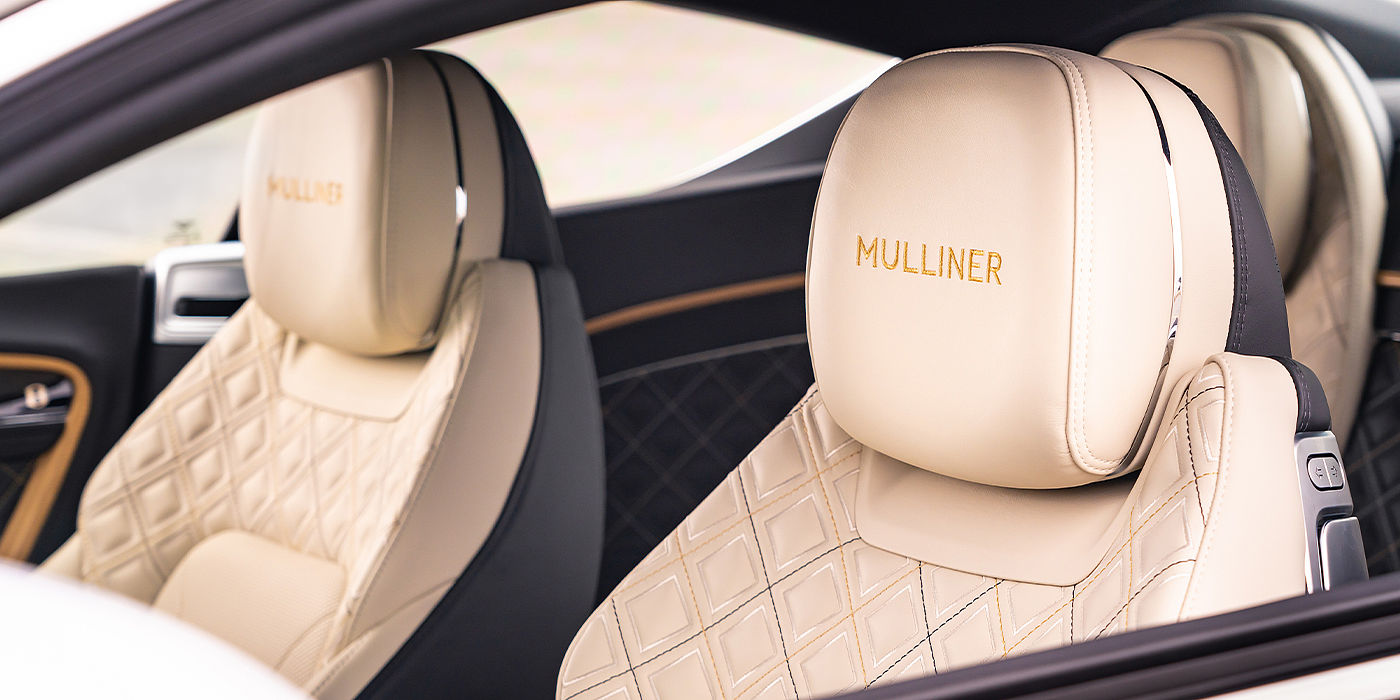 Bentley Manila Bentley Continental GT Mulliner coupe seat detail in Beluga black and Linen hide