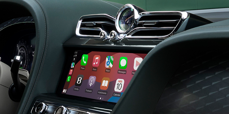 Bentley Manila Bentley Bentayga Extended Wheelbase SUV front interior close up MMI screen with Cumbrian Green hide surround