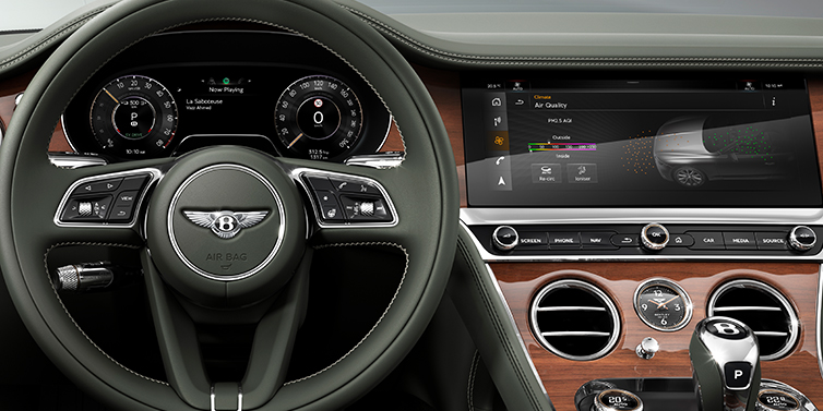 Bentley Manila New Bentley Continental GTC convertible front interior steering wheel view, with Beluga black leather and Crown Cut walnut veneer